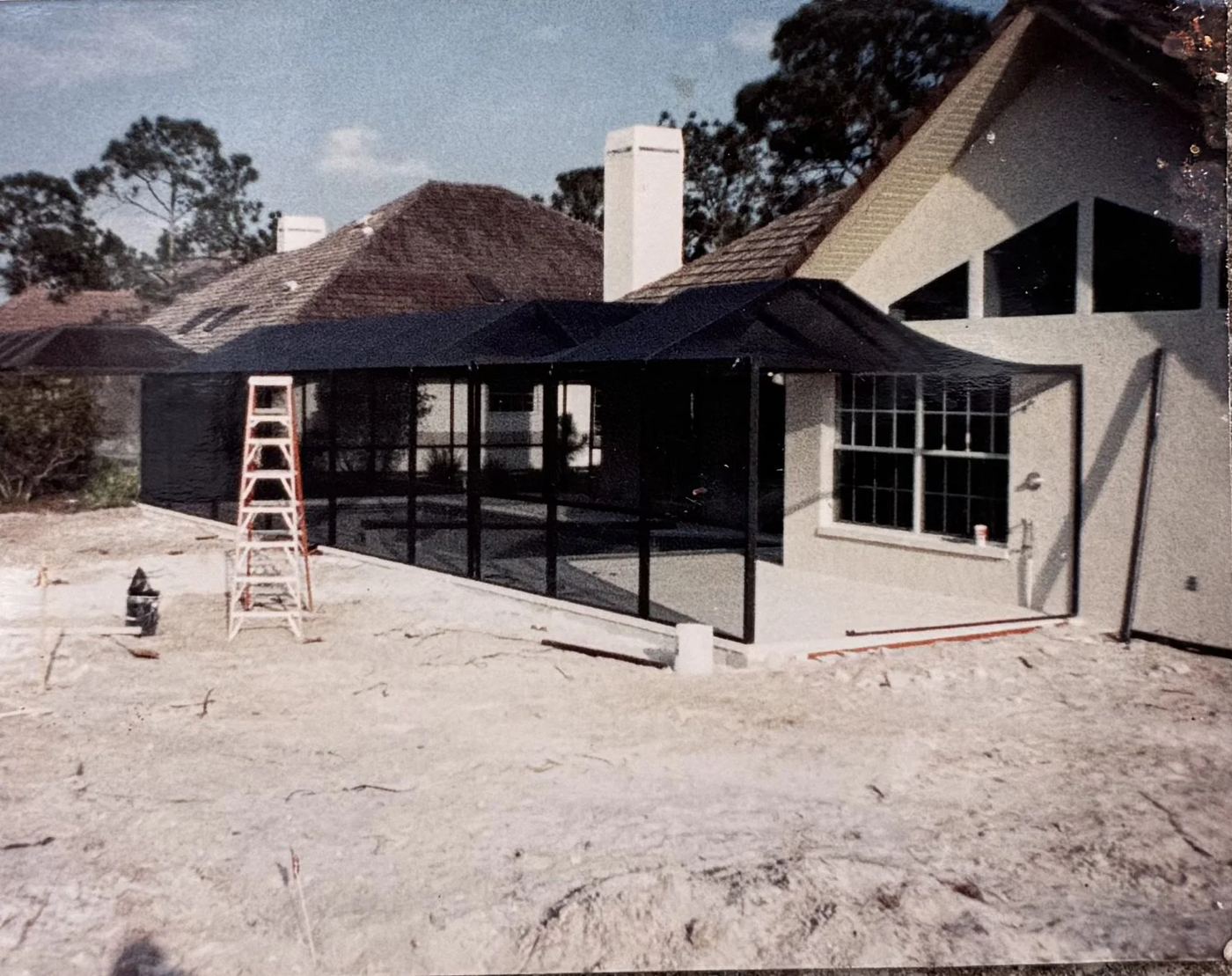 Reinforced aluminum beam enclosure under construction